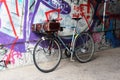 Germany, Berlin: Old bicycle against the background of graffiti Royalty Free Stock Photo