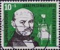 GERMANY - CIRCA 1956: a charitably postage stamp printed in Germany showing a portrait of Ignaz PH Semmelweis a helper of humanity