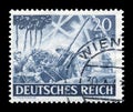 GERMANY - CIRCA 1943: German historical stamp: automatic gun Flak-30 light anti-aircraft artillery system, air defense of the Wehr Royalty Free Stock Photo