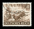 GERMANY - CIRCA 1943: German historical stamp: Machine gunners of the elite division of the Wehrmacht Waffen-SS with machine gun m