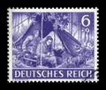 GERMANY - CIRCA 1943: German historical stamp: Military Communicator, receives and transmits the order on the radio. The signal co Royalty Free Stock Photo