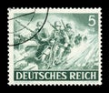 GERMANY - CIRCA 1943: German historical stamp: Military motorcycle units of the Wehrmacht. Motorbike with sidecar with mg-34 machi