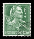 GERMANY - CIRCA 1944: German postage stamp: Woman RAD service worker in uniform with a rake on his shoulders, fair labor brigades,