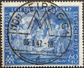 GERMANY - CIRCA 1947: a postage stamp from the german post for the leipziger messe 1947 showing the protection of foreign merchant