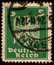 GERMANY - CIRCA 1924: postage stamp 5 German rentphening printed by Germany, shows New imperial eagle, stylized heraldic animal