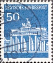 GERMANY - CIRCA 1966: a postage stamp from Germany, showing the Brandenburg Gate in Berlin blue