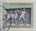 GERMANY - CIRCA 1984 : a postage stamp from Germany, showing a detail from a grave stele of Oclatius from the 1st century found i