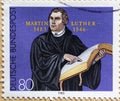 GERMANY - CIRCA 1983 : a postage stamp from Germany, showing a portrait of the reformer and theologian Martin Luther on his 500th