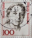 GERMANY - CIRCA 1988 : a postage stamp from Germany, showing a woman from German history the actress Therese Giehse