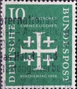 GERMANY - CIRCA 1956: This postage stamp in green shows the Jerusalem Cross, the symbol of the German Evangelical Church Day 1956