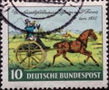 GERMANY - CIRCA 1952: a postage stamp printed in Germany showing an image of a horse-drawn carriage of the letter mail transport o
