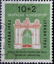 GERMANY - CIRCA 1953: the postage stamp printed in Germany shows the portal of the Palais Thurn und Taxis Frankfurt river Main 1