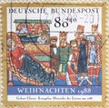 GERMANY - CIRCA 1988 : a postage stamp from Germany, showing Birth of Christ, illustration from the Gospels of Heinrich the Lion.
