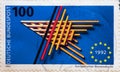 GERMANY - CIRCA 1992 : a postage stamp from Germany, showing the European emblem and five-pointed EU star, made of bars. European Royalty Free Stock Photo