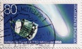 GERMANY - CIRCA 1986 : a postage stamp from Germany, showing a Giotto space probe and Halley`s comet in orbit