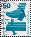 GERMANY - CIRCA 1971: a postage stamp from Germany, showing Motive for accident prevention. Text: Security at all times. Woman`s