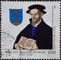 GERMANY - CIRCA 1997 : a postage stamp from Germany, showing a portrait of the classical philologist, philosopher, astrologer, hu