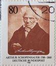 GERMANY - CIRCA 1988 : a postage stamp from Germany, showing a portrait of the German philosopher and university professor Arthur