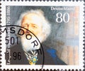 GERMANY - CIRCA 1995 : a postage stamp from Germany, showing a portrait of the historian, historiographer, university professor Le