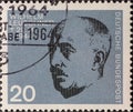 GERMANY - CIRCA 1964: a postage stamp showing a portrait of XXX who was a resistance fighter against Adolf Hitler. 20th anniversar Royalty Free Stock Photo