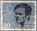 GERMANY - CIRCA 1964: a postage stamp showing a portrait of XXX who was a resistance fighter against Adolf Hitler. 20th anniversar Royalty Free Stock Photo