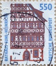 GERMANY - CIRCA 1994 : a postage stamp from Germany, showing sights in Germany. Town hall of Suhl-Heinrichs