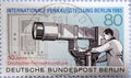GERMANY - CIRCA 1985 : a postage stamp from Germany, showing a television broadcast, television camera and television receiver. In