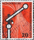 GERMANY - CIRCA 1955:This postage stamp shows a railway signal against a red background. The reason for this postage stamp was the