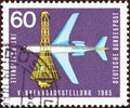 GERMANY - CIRCA 1965: A stamp printed in Germany shows Boeing 727-100 Airliner and Space Capsule, circa 1965.