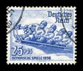 GERMANY - CIRCA 1935: A team of four athletes in a bobsleigh sled. The 4th Olympic winter games 1936 in Garmisch-Partenkirchen, Ge