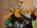 Participants wears an funny hats with artificial flowers