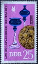 GERMANY, DDR - CIRCA 1977 : a postage stamp from Germany, GDR showing Arts and crafts made of glass and wood; Exhibits from the `