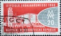 GERMANY, DDR - CIRCA 1960 : a postage stamp from Germany, GDR showing buildings at the north entrance of the Technical Fair, styl