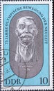 GERMANY, DDR - CIRCA 1969: a postage stamp from Germany, GDR showing a bust of Pierre de Coubertin. Text: 75 years of the modern O