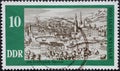 GERMANY, DDR - CIRCA 1975 : a postage stamp from Germany, GDR showing a city view of Weimar around 1650: copper engraving by Matth