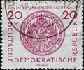 GERMANY, DDR - CIRCA 1956 : a postage stamp from Germany, GDR showing the classic historical seal of the rector of the University