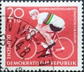 GERMANY, DDR - CIRCA 1960 : a postage stamp from Germany, GDR showing a cyclist in a world champion jersey. Cycling World Champio