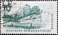 GERMANY, DDR - CIRCA 1957 : a postage stamp from Germany, GDR showing the drawing of a Bucket wheel excavator for lignite mining a