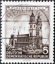 GERMANY, DDR - CIRCA 1955 : a postage stamp from Germany, GDR showing a drawing of the Magdeburg Cathedral. Restored historical b