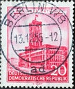 GERMANY, DDR - CIRCA 1955 : a postage stamp from Germany, GDR showing a drawing of the red town hall in Berlin. Restored historic