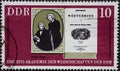 GERMANY, DDR - CIRCA 1975 : a postage stamp from Germany, GDR showing the German dictionary by Jakob and Wilhelm Grimm Grimm Brot