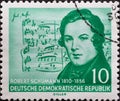 GERMANY, DDR - CIRCA 1956 : a postage stamp from Germany, GDR showing a half-length portrait from half-length portrait by Robert S