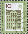 GERMANY, DDR - CIRCA 1962 : a postage stamp from Germany, GDR showing the historic house Zum Arabischen Coffe Baum in Leipzig, tra