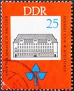 GERMANY, DDR - CIRCA 1966  : a postage stamp from Germany, GDR showing the house of the Sorbs in Bautzen. 150th birthday of Jan Ar Royalty Free Stock Photo