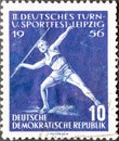 GERMANY, DDR - CIRCA 1956 : a postage stamp from Germany, GDR showing a javelin thrower with short sports trousers throwing a jave