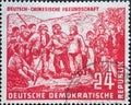 GERMANY, DDR - CIRCA 1951 : a postage stamp from Germany, GDR showing the land survey as part of the land reform. German-Chinese f