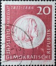 GERMANY, DDR - CIRCA 1961 : a postage stamp from Germany, GDR showing a medal with the profile of the composer Franz Liszt .150. B