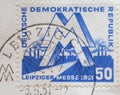 GERMANY, DDR - CIRCA 1951 : a postage stamp from Germany, GDR showing a `MM` trade mark in front of an industrial plant. Leipzig