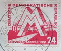 GERMANY, DDR - CIRCA 1951 : a postage stamp from Germany, GDR showing a `MM` trade mark in front of an industrial plant. Leipzig