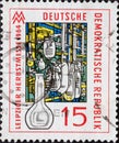 GERMANY, DDR - CIRCA 1964 : a postage stamp from Germany, GDR showing Modern fittings made from fireproof Jena glass. Leipzig Autu